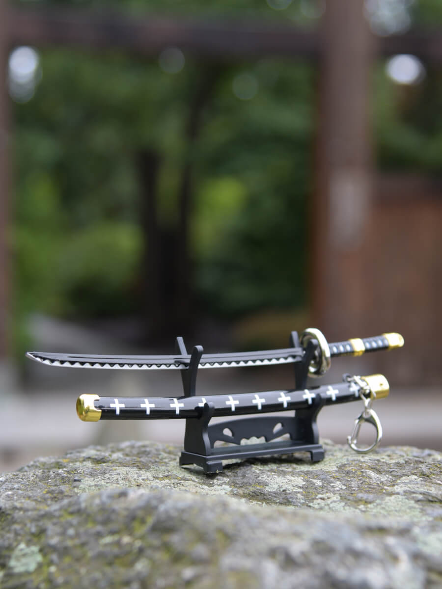 Angled perspective focusing on the blade of Trafalgar miniature katana, highlighting its pristine condition and sharpness.