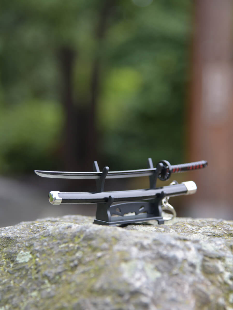 Angled view of the blade of Tanjiro miniature katana, emphasizing its sleek design and sharpness.